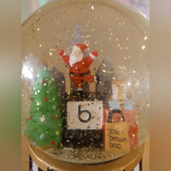 Bloomingdale's Musical Christmas Snow Globe plays to the tune "Jingle Bells" - Picture 4 of 9
